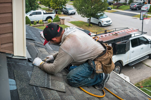 Professional Roofing technician working in Gilson, IL